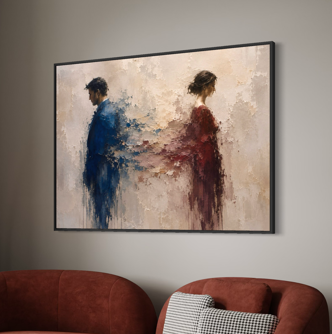 Tableau couple séparation – À Contre-Cœur, décoration murale émotionnelle et contemporaine Tableau À Contre-Cœur encadré au-dessus de fauteuils rouges dans un salon contemporain