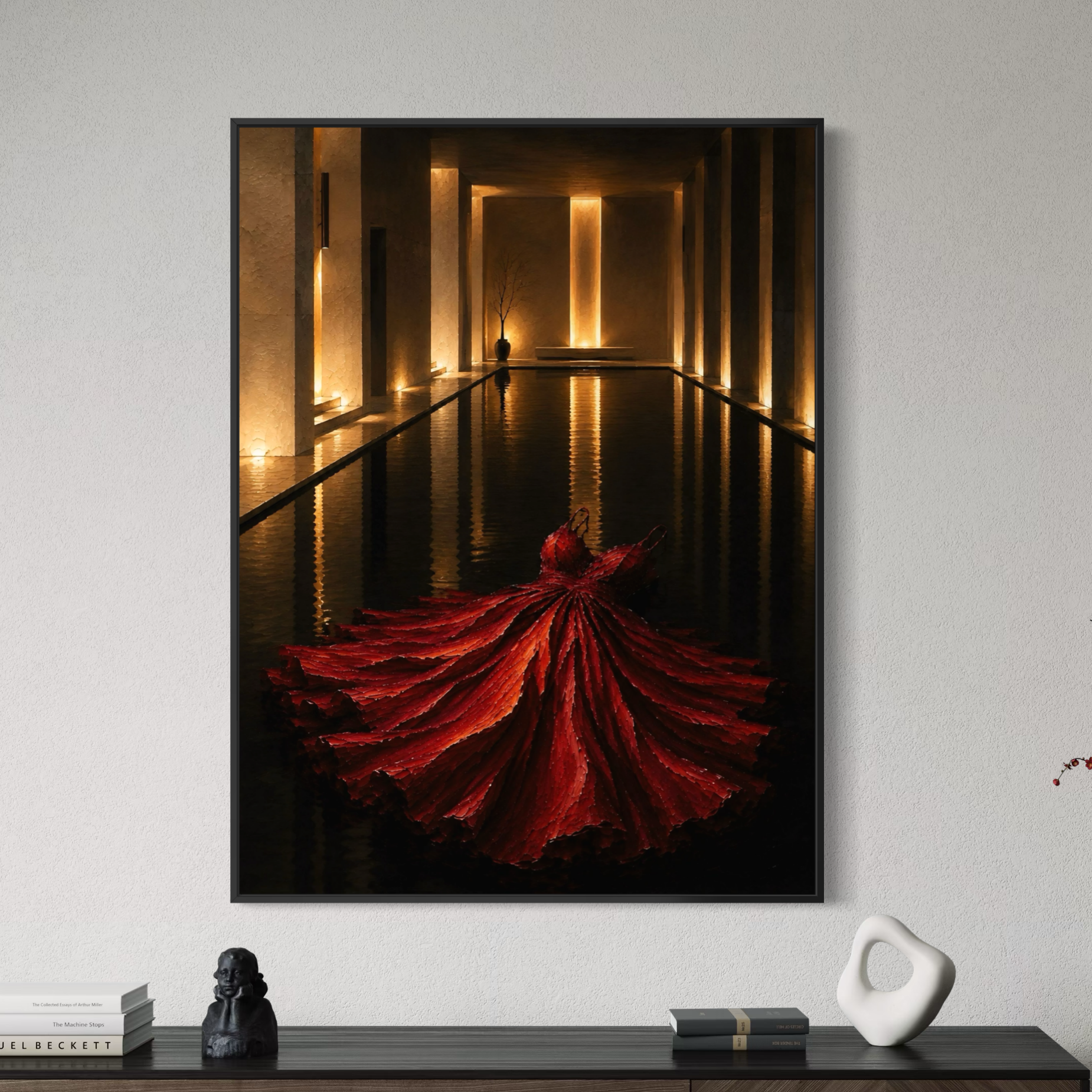 Rouge Impérial – Tableau contemporain robe rouge et lumière dorée Rouge Impérial encadré en noir au-dessus d’un meuble contemporain dans un salon aux tons neutres.